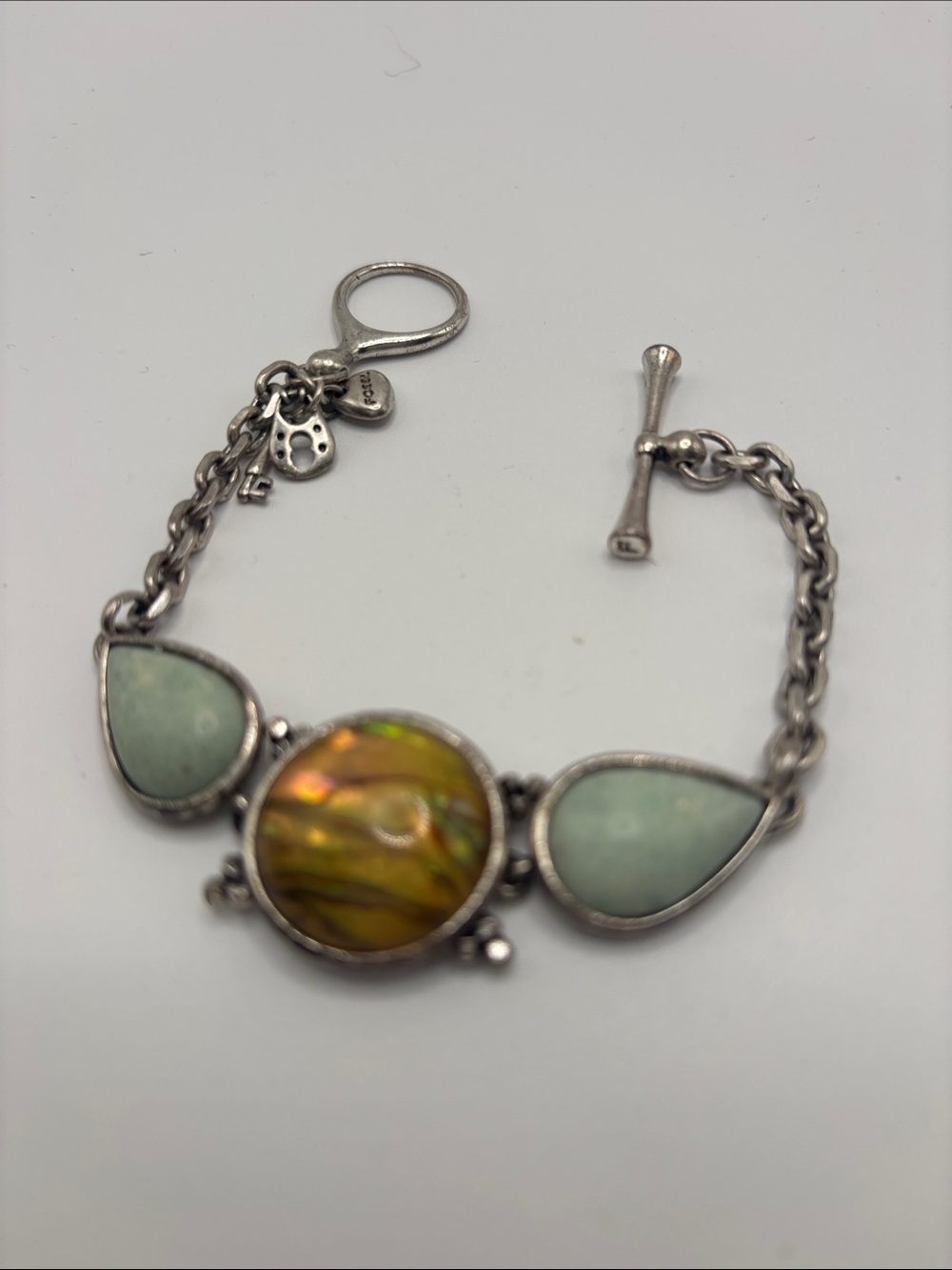 Fossil Silver Tone Bracelet with Green Teardrop Stones and Iridescent Center